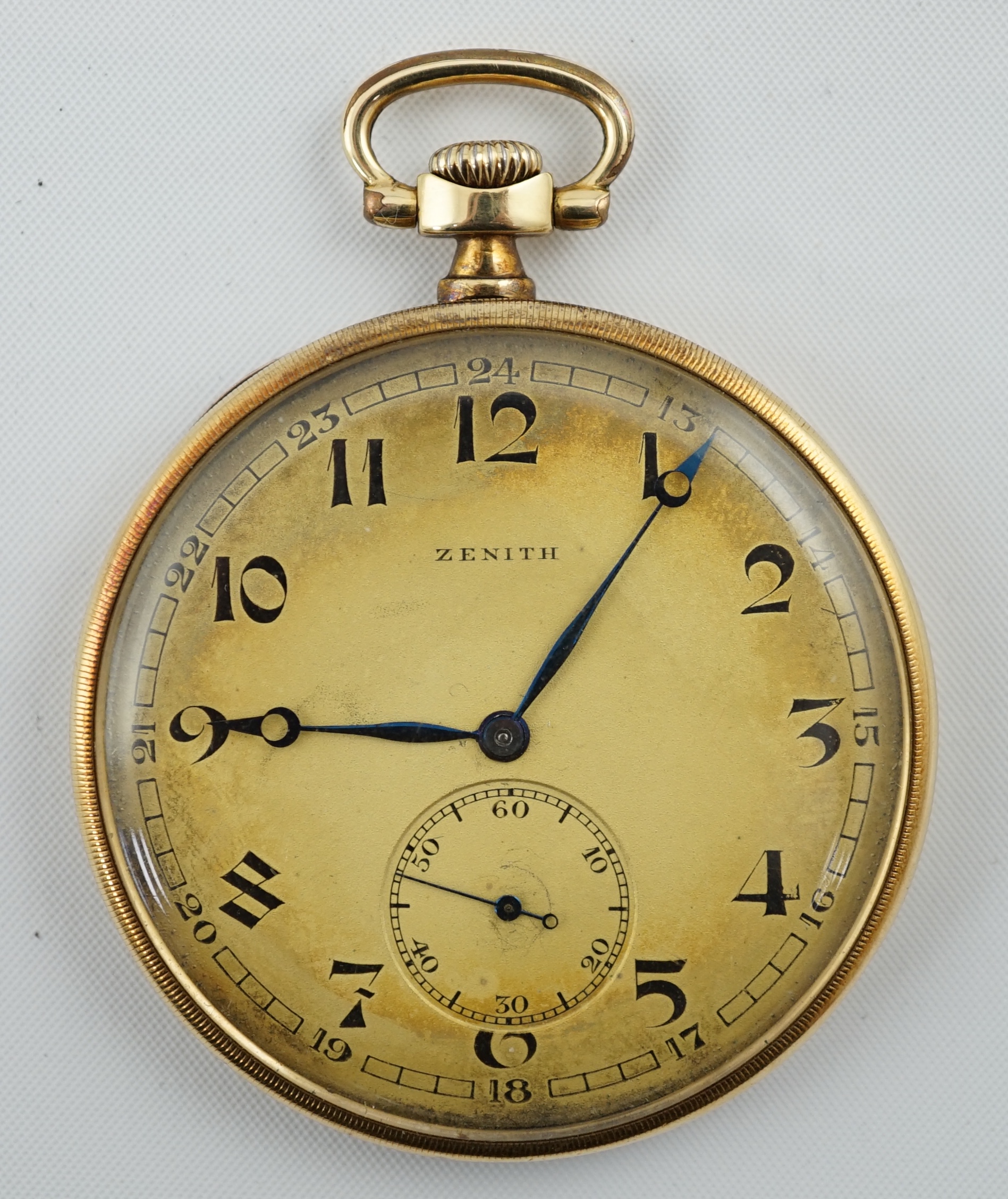 A Zenith 14K gold open faced keyless dress pocket watch